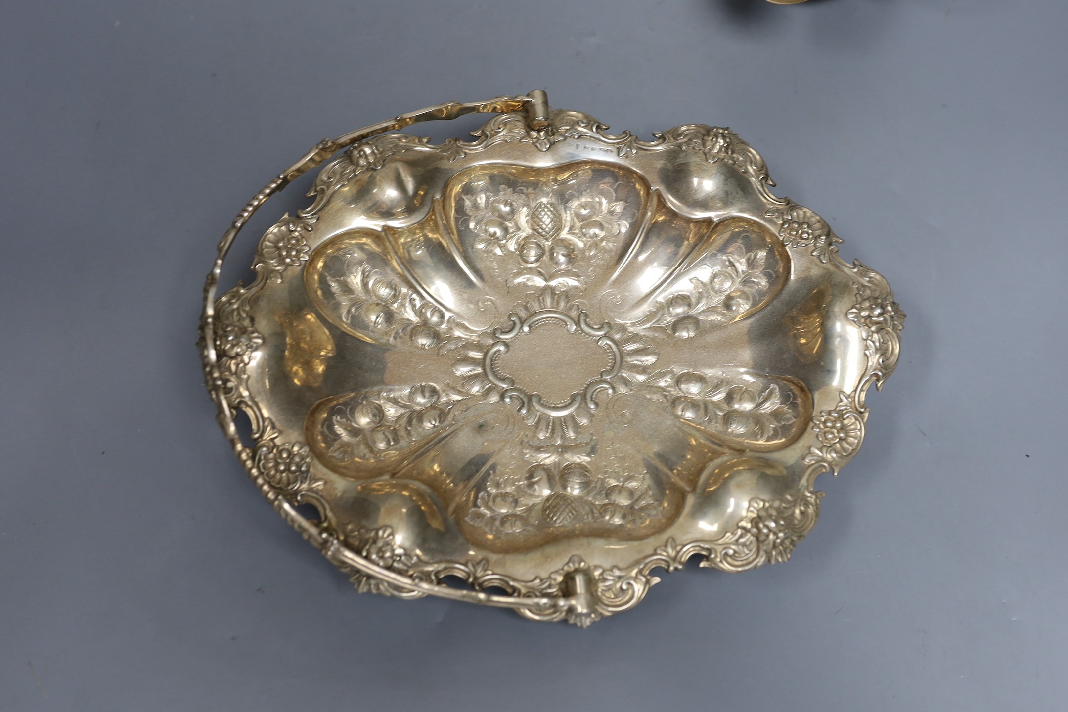 Assorted silver including a Victorian bullet shaped teapot, Arthur Sibley, London, 1878, height 12.1cm, sauceboat, cream jug, sugar bowl, cup, tea strainer, watch holder, match sleeve, pair of ashtrays, lighter, three na